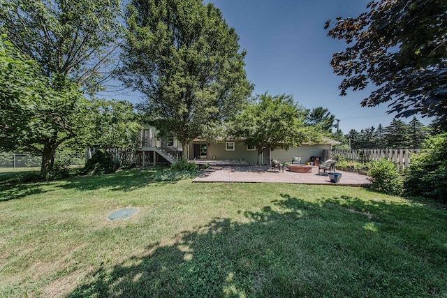7532 Dell Rd, Saline, MI 48176 - back of property with a patio area and stairway