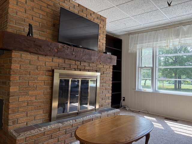 22347 5 Mile Rd, Morley, MI 49336 - detailed view of a brick fireplace and carpet flooring