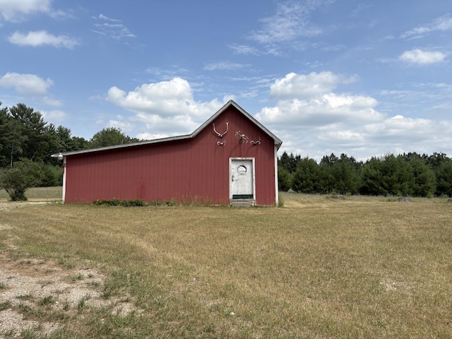 22347 5 Mile Rd, Morley, MI 49336 - view of pole building with a lawn