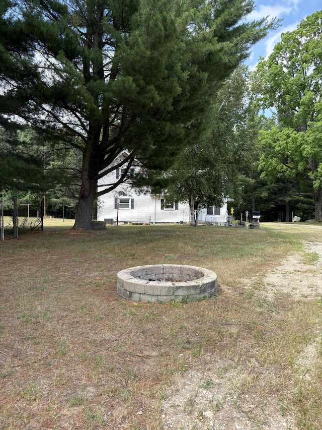 22347 5 Mile Rd, Morley, MI 49336 - view of yard with an outdoor fire pit