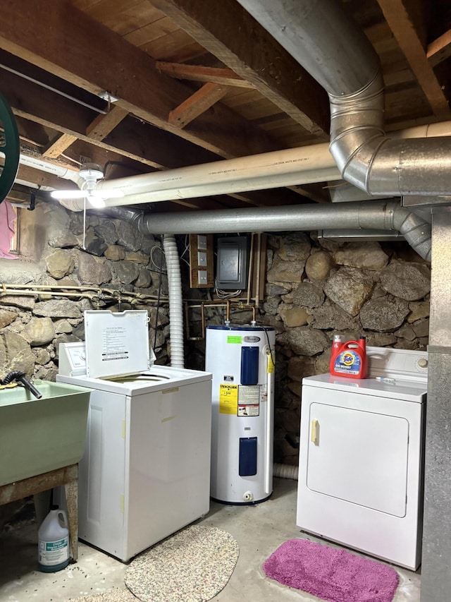 22347 5 Mile Rd, Morley, MI 49336 - laundry area with water heater and independent washer and dryer