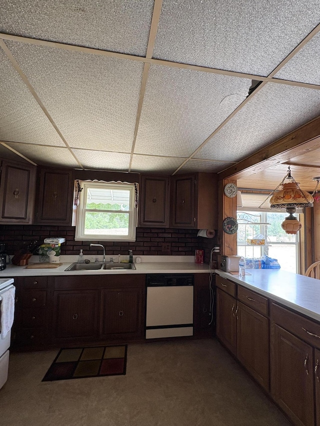 22347 5 Mile Rd, Morley, MI 49336 - kitchen with dishwasher, light countertops, a drop ceiling, dark brown cabinets, and electric range oven