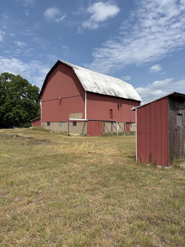 22347 5 Mile Rd, Morley, MI 49336 - view of barn featuring a lawn