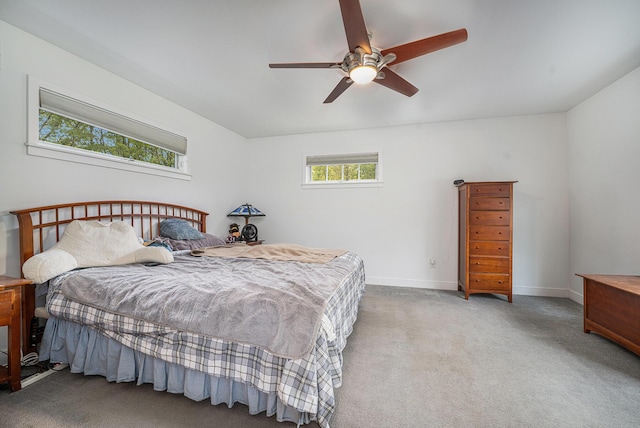9266 Maricopa Trl, Kalamazoo, MI 49009 - carpeted bedroom with baseboards and a ceiling fan