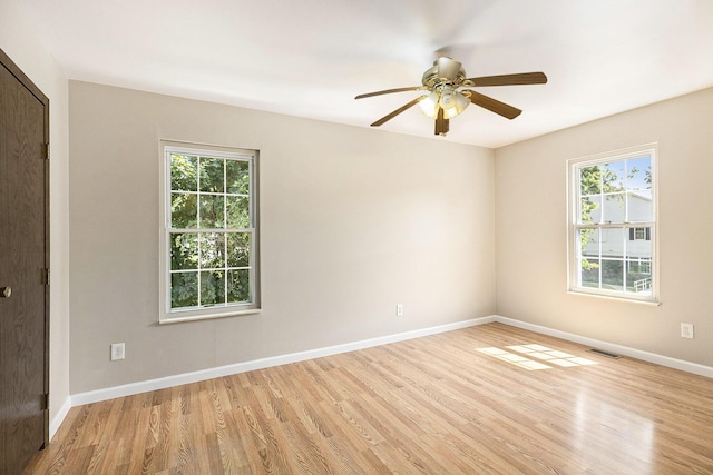 1415 Wingate Blvd, Ypsilanti, MI 48198 - empty room with light wood-style flooring and ceiling fan