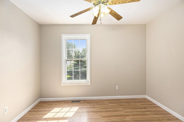 1415 Wingate Blvd, Ypsilanti, MI 48198 - spare room with light wood finished floors and ceiling fan