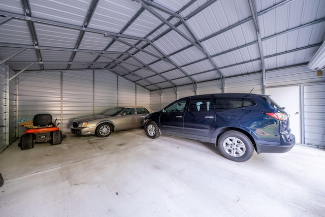 1051 Vallado Dr, Weidman, MI 48893 - garage featuring metal wall