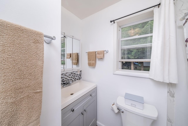 1051 Vallado Dr, Weidman, MI 48893 - bathroom featuring backsplash and vanity