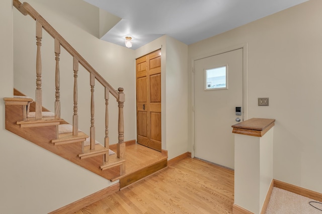 2145 Steeplechase Dr, Ann Arbor, MI 48103 - foyer featuring stairway and light wood finished floors