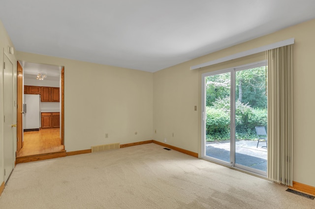 2145 Steeplechase Dr, Ann Arbor, MI 48103 - empty room featuring light carpet and baseboards