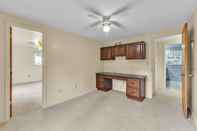 2145 Steeplechase Dr, Ann Arbor, MI 48103 - unfurnished office with a ceiling fan and light carpet