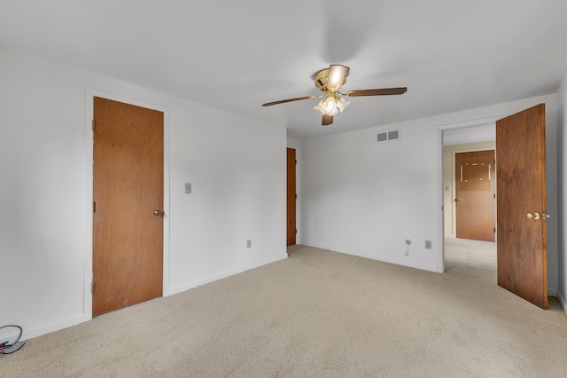 2145 Steeplechase Dr, Ann Arbor, MI 48103 - empty room with a ceiling fan and carpet floors
