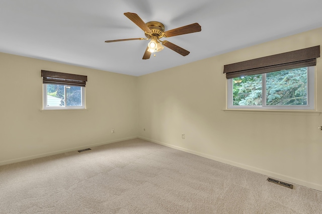 2145 Steeplechase Dr, Ann Arbor, MI 48103 - carpeted spare room with plenty of natural light and ceiling fan