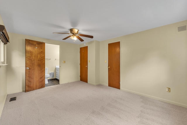 2145 Steeplechase Dr, Ann Arbor, MI 48103 - unfurnished bedroom with carpet flooring, ensuite bath, and a ceiling fan