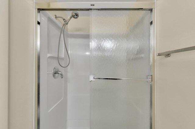 2145 Steeplechase Dr, Ann Arbor, MI 48103 - full bathroom with an enclosed shower