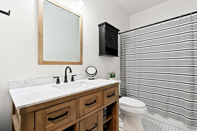 7499 Mathews Rd, Spring Arbor, MI 49283 - bathroom featuring vanity, tile patterned floors, and a shower with shower curtain