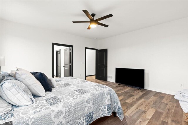 7499 Mathews Rd, Spring Arbor, MI 49283 - bedroom with wood finished floors and ceiling fan