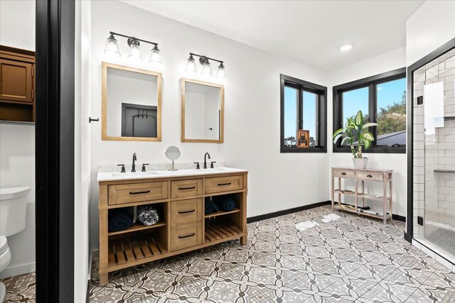 7499 Mathews Rd, Spring Arbor, MI 49283 - full bathroom with double vanity and a tile shower