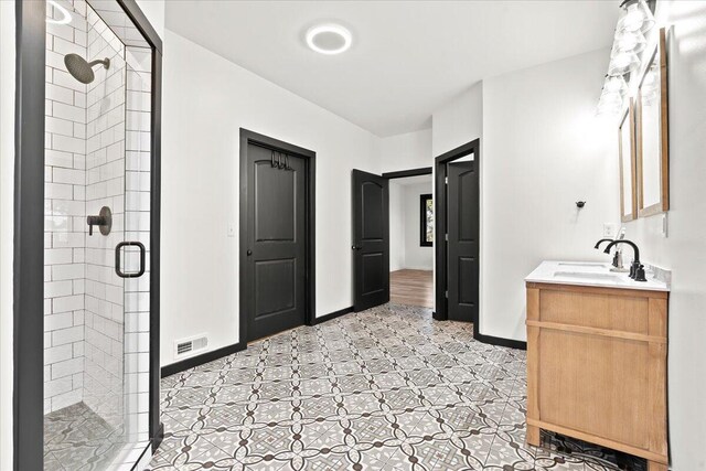 7499 Mathews Rd, Spring Arbor, MI 49283 - bathroom featuring a stall shower and vanity