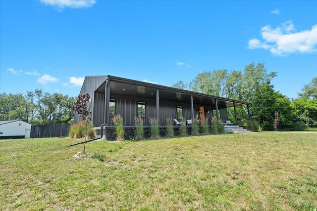 7499 Mathews Rd, Spring Arbor, MI 49283 - back of property with board and batten siding