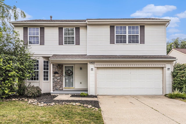 7400 Willow Creek Dr, Ypsilanti, MI 48197 - traditional-style house with driveway and an attached garage