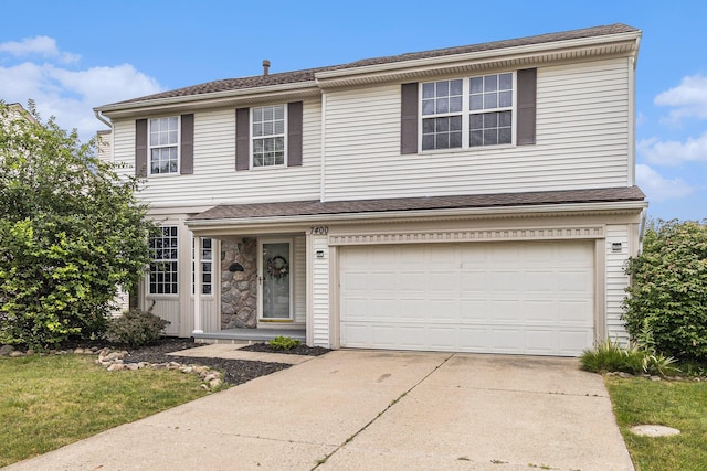 7400 Willow Creek Dr, Ypsilanti, MI 48197 - view of front of home featuring concrete driveway and a garage