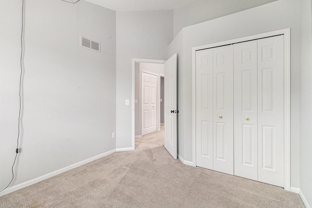 7400 Willow Creek Dr, Ypsilanti, MI 48197 - unfurnished bedroom with light colored carpet and a closet