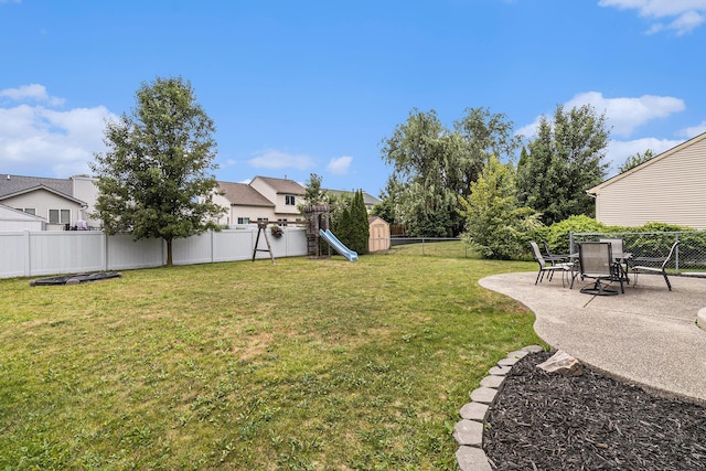 7400 Willow Creek Dr, Ypsilanti, MI 48197 - fenced backyard featuring a storage shed and a patio