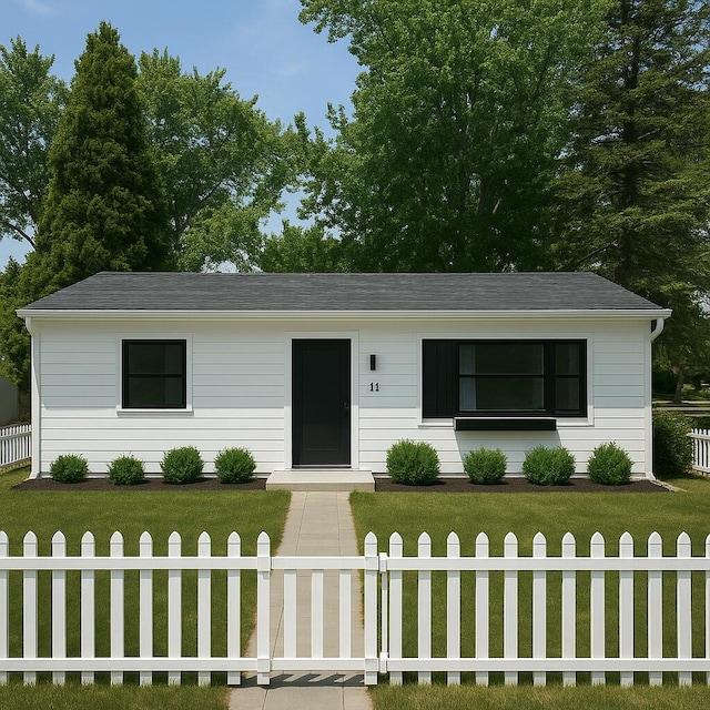 111 Butternut St, Three Oaks, MI 49128 - ranch-style house featuring a fenced front yard