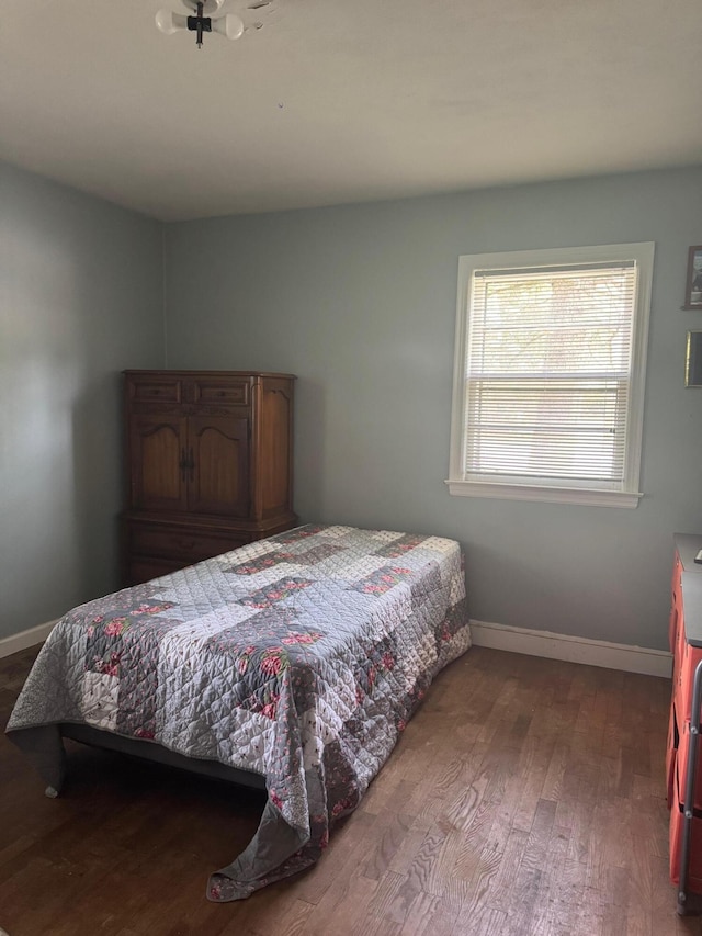 111 Butternut St, Three Oaks, MI 49128 - bedroom with wood finished floors and baseboards
