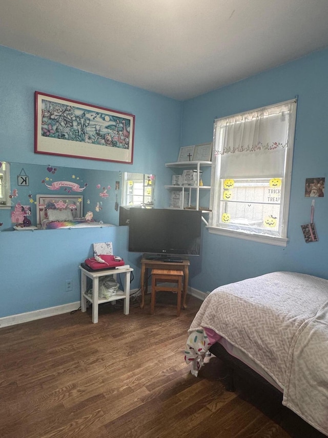 111 Butternut St, Three Oaks, MI 49128 - bedroom featuring wood finished floors and baseboards