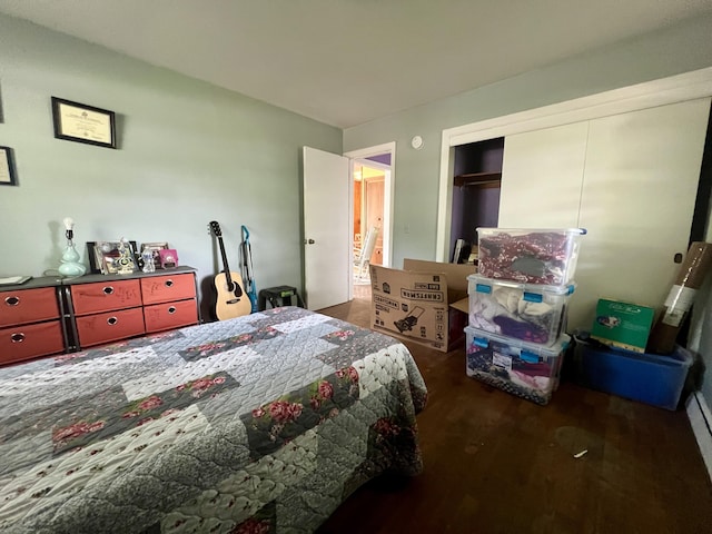 111 Butternut St, Three Oaks, MI 49128 - bedroom with wood finished floors and a closet