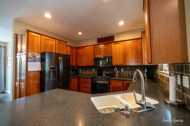 622 Cedar Square St, Holland, MI 49423 - kitchen with appliances with stainless steel finishes, dark countertops, recessed lighting, backsplash, and brown cabinets