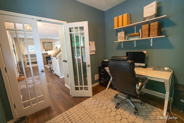 622 Cedar Square St, Holland, MI 49423 - home office with wood finished floors, vaulted ceiling, and french doors