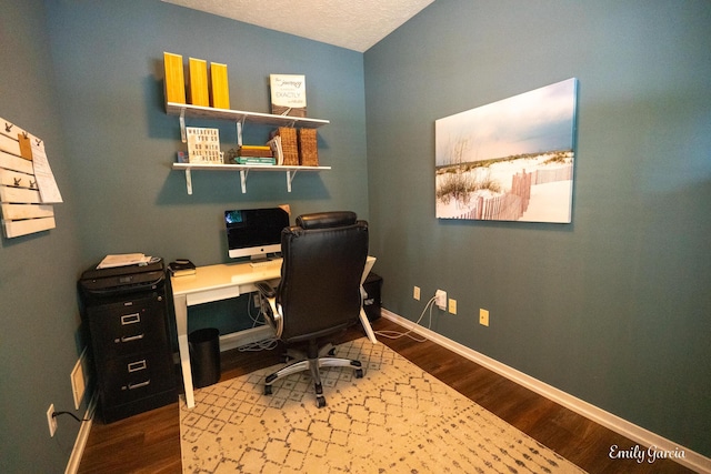 622 Cedar Square St, Holland, MI 49423 - office space featuring dark wood-type flooring and vaulted ceiling