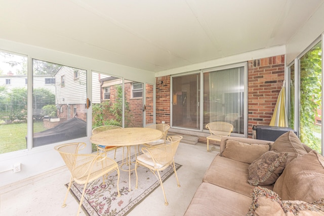 2707 Brandywine Dr, Ann Arbor, MI 48104 - sunroom featuring outdoor dining space and an outdoor hangout area