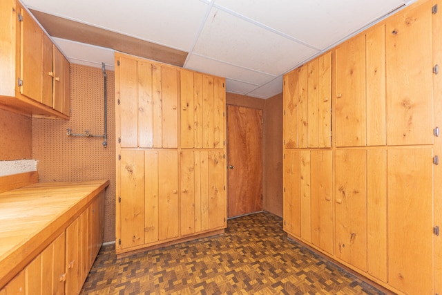 2707 Brandywine Dr, Ann Arbor, MI 48104 - kitchen with a drop ceiling and wooden walls