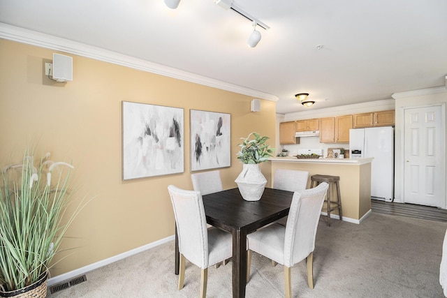 2756 Barclay Way, Ann Arbor, MI 48105 - carpeted dining room featuring crown molding and rail lighting