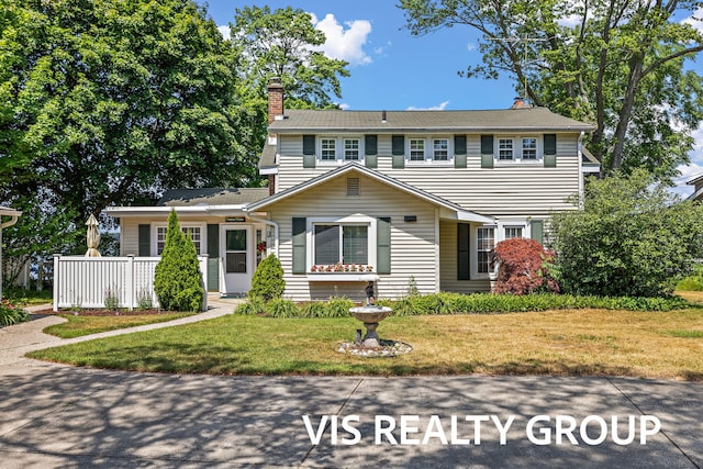 537 Buena Vista Dr, Spring Lake, MI 49456 - view of front of home featuring a chimney