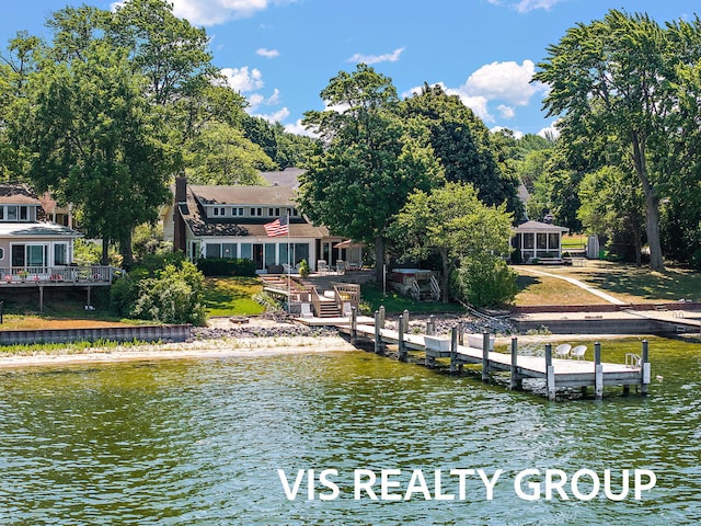 537 Buena Vista Dr, Spring Lake, MI 49456 - dock area with a water view and a boat ramp