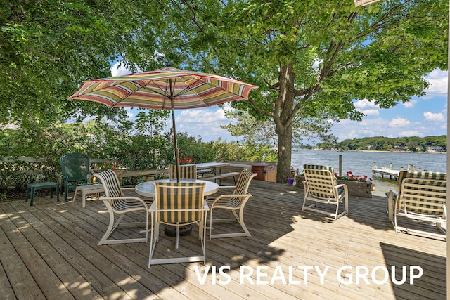 537 Buena Vista Dr, Spring Lake, MI 49456 - wooden deck with a water view, a hot tub, and outdoor dining space
