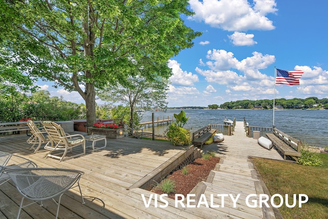 537 Buena Vista Dr, Spring Lake, MI 49456 - wooden terrace featuring a water view and a boat dock