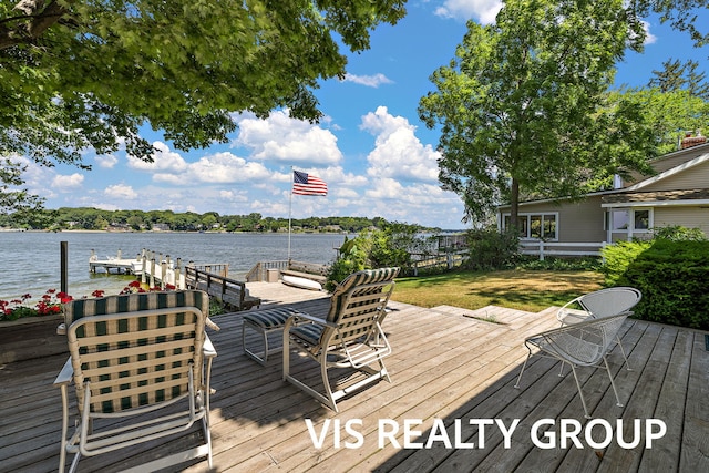 537 Buena Vista Dr, Spring Lake, MI 49456 - wooden deck featuring a boat dock and a water view