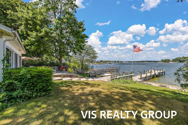 537 Buena Vista Dr, Spring Lake, MI 49456 - dock with a water view and a lawn