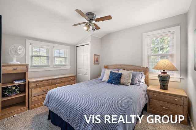537 Buena Vista Dr, Spring Lake, MI 49456 - bedroom featuring lofted ceiling, a closet, and a ceiling fan