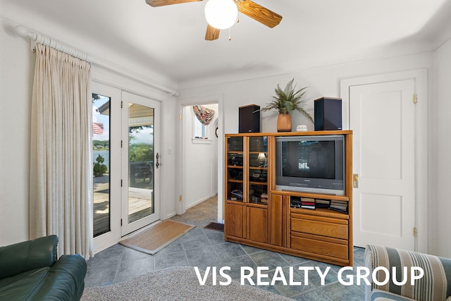 537 Buena Vista Dr, Spring Lake, MI 49456 - living area featuring ceiling fan and tile patterned floors
