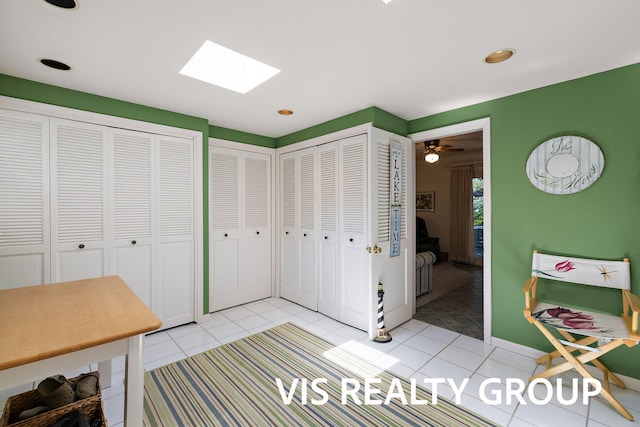 537 Buena Vista Dr, Spring Lake, MI 49456 - office space featuring a skylight, light tile patterned floors, and recessed lighting