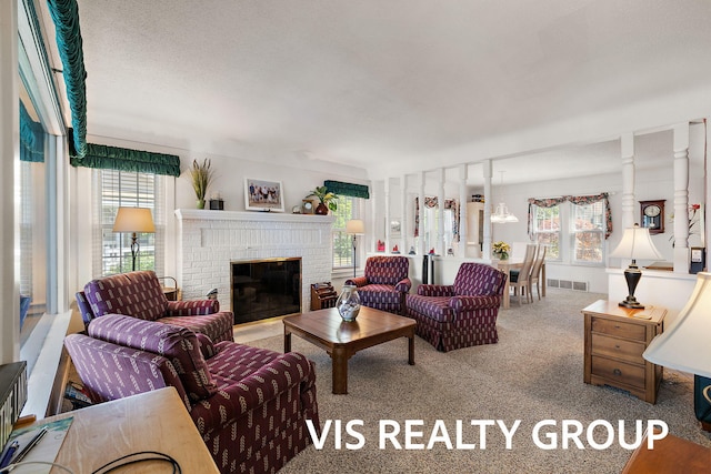 537 Buena Vista Dr, Spring Lake, MI 49456 - carpeted living area with a brick fireplace