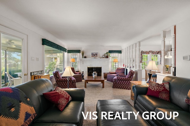 537 Buena Vista Dr, Spring Lake, MI 49456 - living room featuring healthy amount of natural light, a fireplace, and carpet floors
