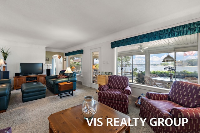 537 Buena Vista Dr, Spring Lake, MI 49456 - living area with carpet, healthy amount of natural light, and a water view